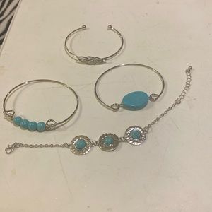 LOT OF 4 BRACELETS .